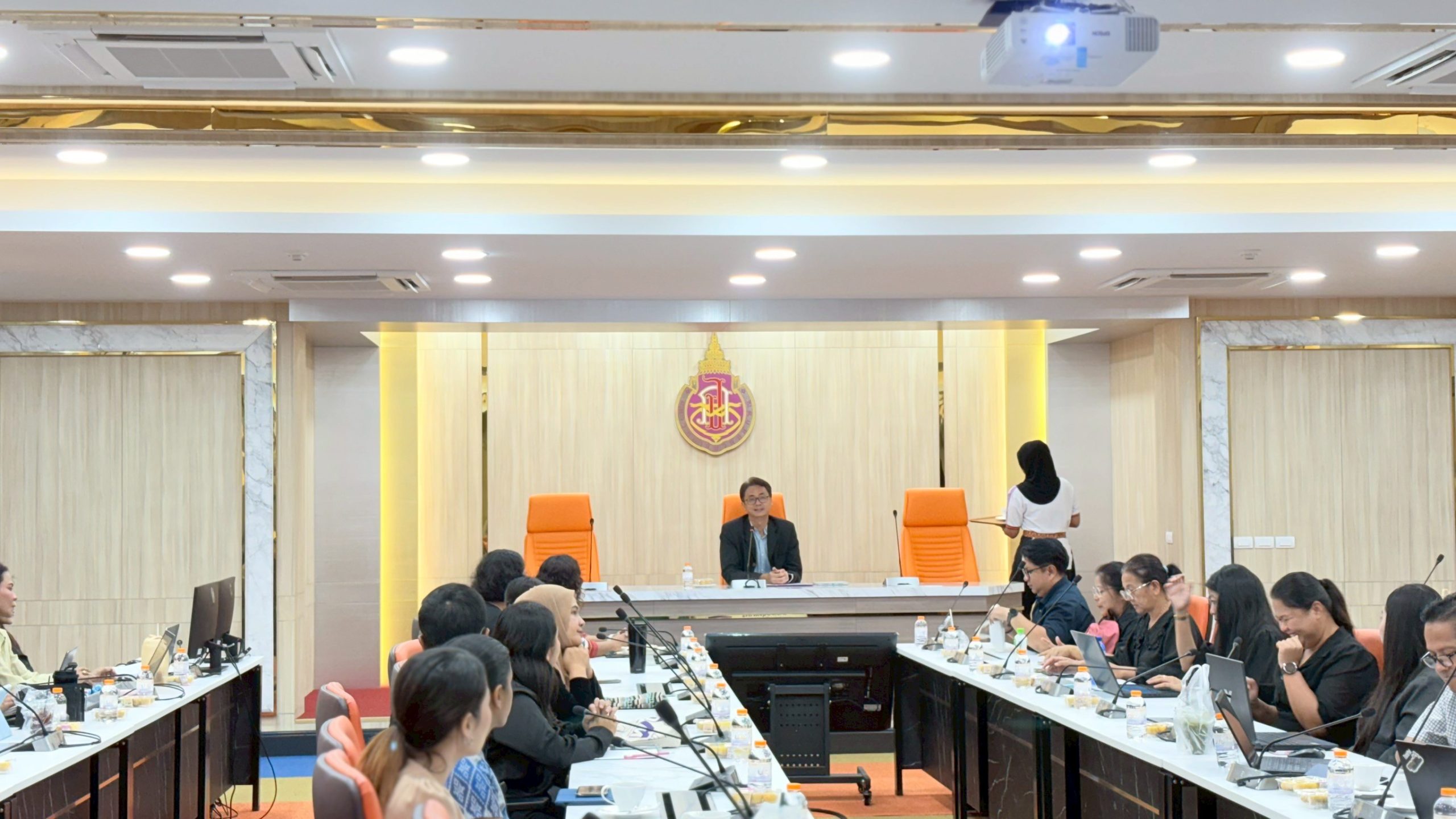University executives, academic staff, and personnel attending the training